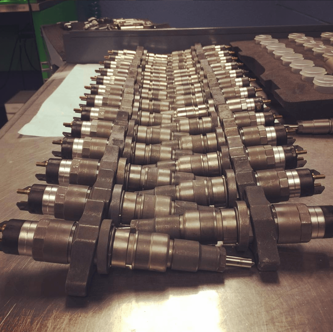 Common rail diesel injectors on the test bench at Valley Fuel Injection